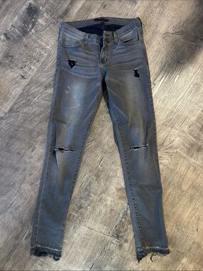 Women’s Distressed Black Skinny Jeans